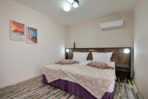 Voodi või voodid majutusasutuse Hotel Hello Hissar toas