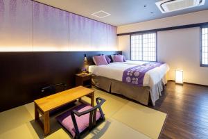 Postel nebo postele na pokoji v ubytování Hotel Claire Higasa + 37 fotografií