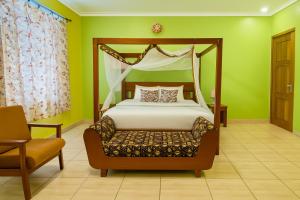 Postel nebo postele na pokoji v ubytování Yambi Guesthouse
