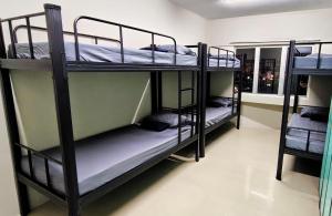 Postel nebo postele na pokoji v ubytování Jeea Hostel