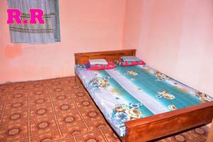 Ένα ή περισσότερα κρεβάτια σε δωμάτιο στο Delft island home stay