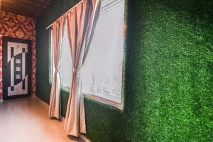 Fotografie z fotogalerie ubytování Super Hotel O Champasari Siliguri formerly Four Fox Suits v destinaci Panchanai + 27 fotografií