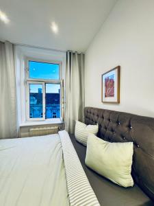 Voodi või voodid majutusasutuse Comfy & Cozy 4BR Shared Apt next to Kaufpark Alterlaa toas
