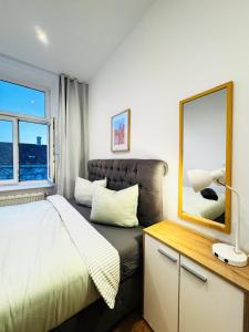 Voodi või voodid majutusasutuse Comfy & Cozy 4BR Shared Apt next to Kaufpark Alterlaa toas