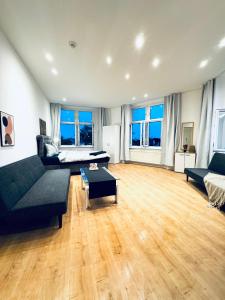 Istumisnurk majutusasutuses Comfy & Cozy 4BR Shared Apt next to Kaufpark Alterlaa