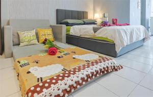 Postel nebo postele na pokoji v ubytování 5mins to Sunway Pyramid #Subang SS15 Cozy Studio Menara Rajawali