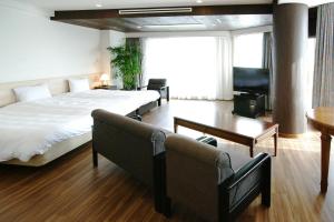 Voodi või voodid majutusasutuse Izumigo AMBIENT Izu-Kogen Condominium toas