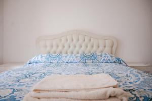 Letto o letti in una camera di Vigna Stelluti