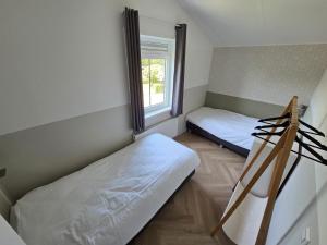 Postel nebo postele na pokoji v ubytování Große Familienvilla mit privat innen Jacuzzi & Sauna