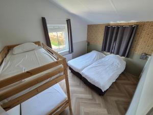 Postel nebo postele na pokoji v ubytování Große Familienvilla mit privat innen Jacuzzi & Sauna