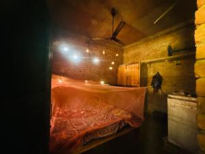 Postel nebo postele na pokoji v ubytování Ashok Homestay