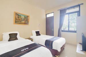 Фотография из галереи Hotel O Bogor near Taman Safari formerly Ken Raudhah Inn в городе Богор