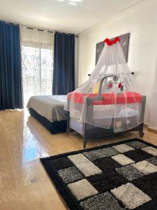 Llit o llits en una habitació de le Cocon