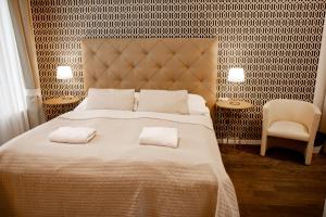 Posteľ alebo postele v izbe v ubytovaní Luxury Modern Designed Oldtown Apartment