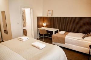 Posteľ alebo postele v izbe v ubytovaní Luxury Modern Designed Oldtown Apartment