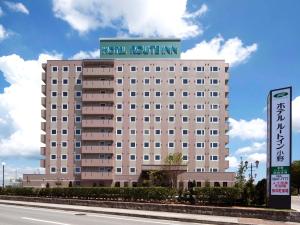 小野市にあるホテルルートイン小野の建物の上に看板のあるホテル