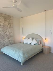 Postel nebo postele na pokoji v ubytování Coast