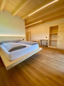 Postel nebo postele na pokoji v ubytování Agritur Casamela