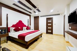 Postel nebo postele na pokoji v ubytování Hotel Fab Stays + 5 fotografií