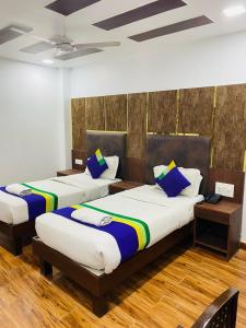 Postel nebo postele na pokoji v ubytování Hotel Fab Stays