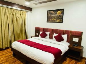 Postel nebo postele na pokoji v ubytování Hotel Fab Stays