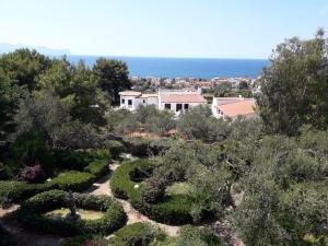 an aerial view of a garden with a house in the background at Villa Nunziatella Badia in Trappeto