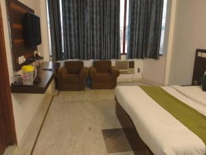 Postel nebo postele na pokoji v ubytování Hotel Shtita Near IGI Airport Delhi
