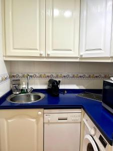 Kuchyň nebo kuchyňský kout v ubytování Apartamento Torre de la Roca Torremolinos