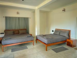 Voodi või voodid majutusasutuse Forestscape Resort Munnar toas