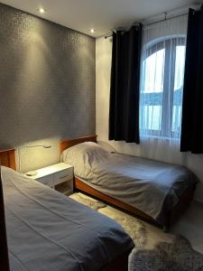 Una cama o camas en una habitación de Apartment Frankie's Place