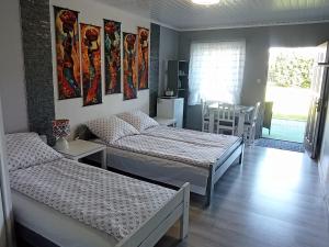 Postel nebo postele na pokoji v ubytování Anrema - Pokoje 21m2