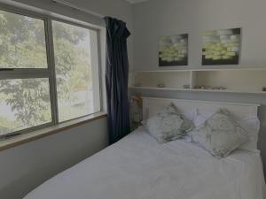 Postel nebo postele na pokoji v ubytování Driftsands Guesthouse