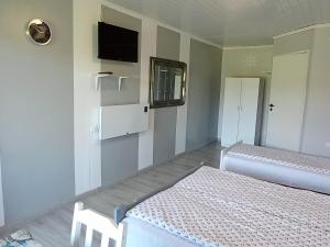 Postel nebo postele na pokoji v ubytování Anrema - Pokoje 21m2