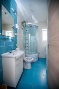 Et badeværelse på Apartment Laura-Villa La dolce vita