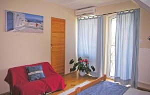 En eller flere senge i et værelse på Pelso apartman