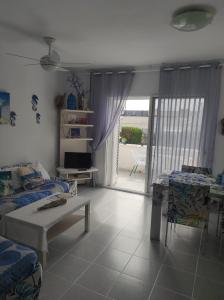 A bed or beds in a room at Mi morena cala llobeta 35