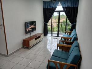 TV a/nebo společenská místnost v ubytování Benoni Garden Apartment Guesthouse