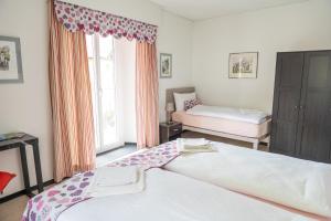 Postel nebo postele na pokoji v ubytování Locanda Poncini + 28 fotografií