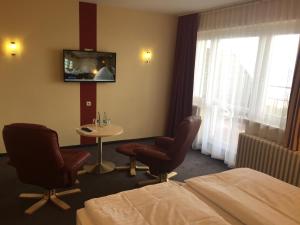 TV a/nebo společenská místnost v ubytování Panorama Hotel Bansin