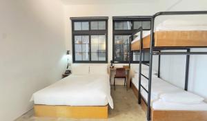 Voodi või voodid majutusasutuse ART'OTEL Ximending TAIPEI toas
