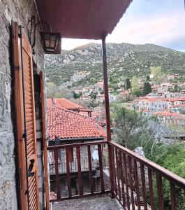 a balcony with a view of a city at Cleopatrahouse in Stemnitsa