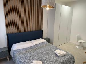 Postel nebo postele na pokoji v ubytování Star Suite Rome