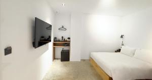 Televiisor ja/või meelelahutuskeskus majutusasutuses ART'OTEL Ximending TAIPEI
