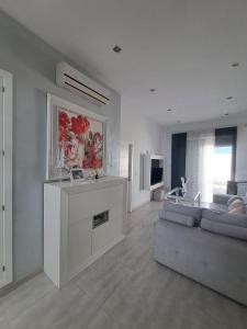 TV a/nebo společenská místnost v ubytování Casa Cañada