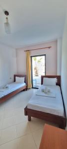 Foto dalla galleria di 2 Palmat Hotel a Ksamil