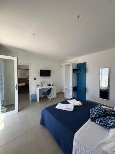 Postel nebo postele na pokoji v ubytování Orizzonte Mare Panoramic Rooms