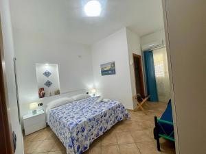 Postel nebo postele na pokoji v ubytování B&B Scala dei Turchi Beach