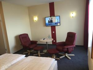 TV a/nebo společenská místnost v ubytování Panorama Hotel Bansin