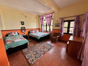 Una cama o camas en una habitación de Siddhartha Garden Ayurveda