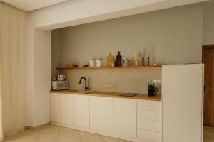 Kuchyň nebo kuchyňský kout v ubytování El Chacha Apartment
